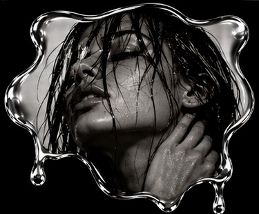 Woman with wet hair, hand at her neck